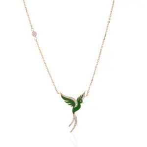 Green Diamond Bird & 18k gold Necklace , unique designer jewellery in uae, ksa & NY