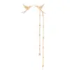 unique stylish gold & diamonds earrings, one is a beautiful bird, the other has a bird and 2 long chains of gold & vs diamonds.