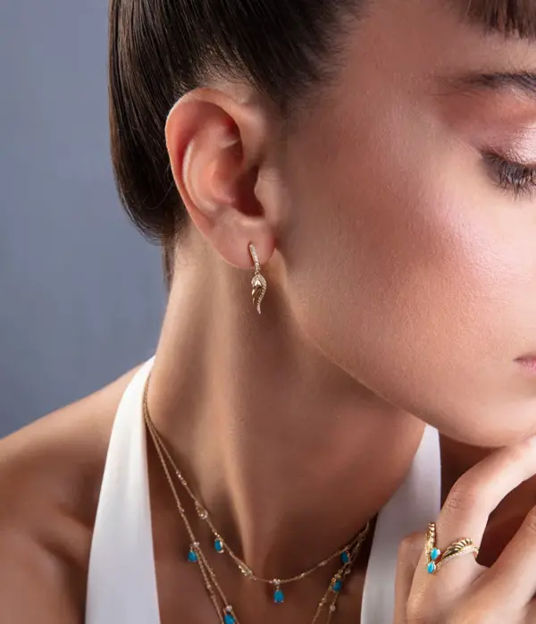 wing drop earring 18k gold designer jewellery in UAE KSA NY